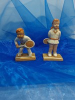 Couple of sweaty ceramic tennis figures
