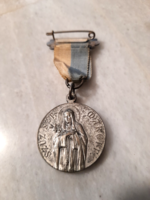 Virgo st. Margaret's religious medal on a ribbon