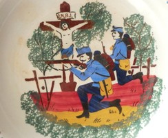 Folk wall plate with a painting depicting a scene from the 1848 Battle of Sadastság