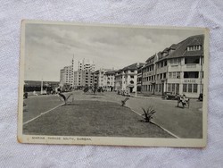 Antique South African cityscape postcard / greeting card in Durban, hotel, cars, rickshaw circa 1910