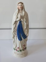 Antique statue of the Virgin Mary.