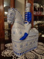 Impressive porcelain riding hussar