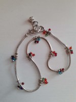 Beautiful condition marked ankle chain adorned with colored tiny glass beads.