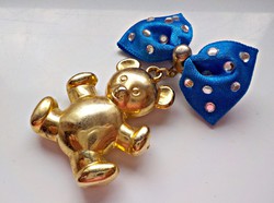 Gilded teddy bear brooch with blue stony bow