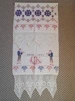 Decorative towel with cross stitching