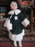 Charming porcelain doll in winter clothes! 67.