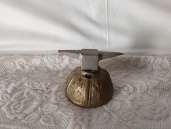 Old watch or jeweler's little anvil