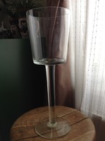 Old large glass table candle with candlestick