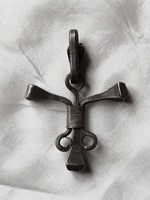 Cross pendant made of forged horseshoe nails