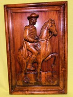 The wooden relief sculpture on a large Hungarian noble horse is the work of an applied artist