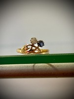 14k gold ring with diamonds and blue sapphires! In monumental value