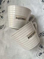 Modern massive white ‘espresso’ cups in pairs.