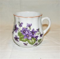 Old mug with a violet pattern - a jar