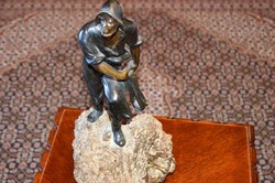 Bronze fisherman statue