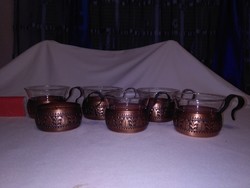 Artistically worked brass cups and Jena glasses - tea