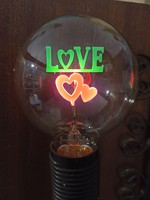 Retro glimm lamp with glowing hearts