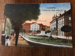 Old postcard with church square in Szombathely with silk sculpture. Color, written. 1920