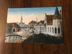 Old postcard. Szombathely-ó-perinti street is colorful, written.