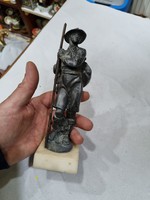 Old tin figure