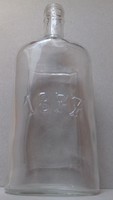 Glass bottle with the inscription 1877