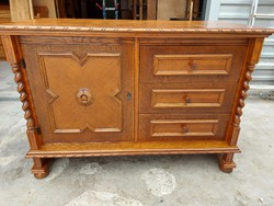 For sale a large 1-door, shelf, 3-drawer colonial chest of drawers