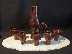 Glazed ceramic brandy set with rooster pouring into 5 chick cups