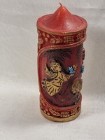 Angelic Christmas candle with painted-gilded decoration.