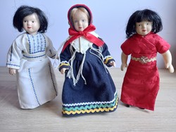Porcelain dolls in their original attire