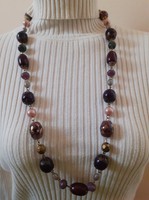 Showy necklace made of various beads (ceramic, glass, tekla, metal, plastic)