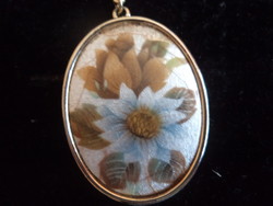 Hand painted pendant in gilded frame on chandelier background
