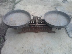 Antique scales with a pair of birds