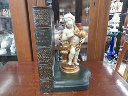 Old putto figural bookend.
