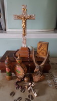 Old ornaments and utility wooden objects for sale at the same time.