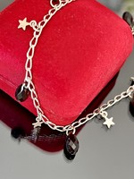 Fabulous silver anklet adorned with pendants