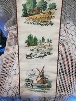 Cross-stitch embroidered maid