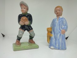 Sweaty ceramic figurines soccer goalkeeper little boy and little girl with teddy bear