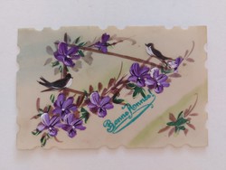 Old painted plastic postcard with violet swallow