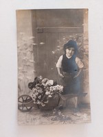 Old postcard photo postcard with little boy in wheelbarrow