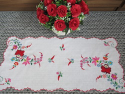 Miracle is a beautiful brightly colored tablecloth from Kalocsa