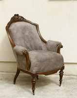 Antique renovated young armchair rolling in Provence vintage style