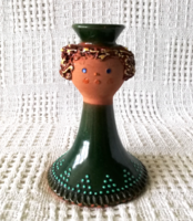 Glazed ceramic figural candlestick