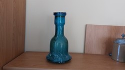 Old glass vase with interesting shape.