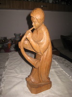 Oak wood carving, young woman with horn, signed