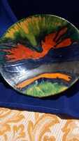 Retro color ceramic wall plate in yellow, green, navy blue, black, orange color cavalcade