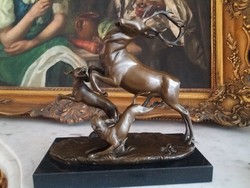 Hunting dogs attacking deer - a prestigious bronze sculpture work of art