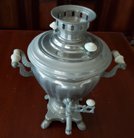 Samovar with glasses and ornate cup holder