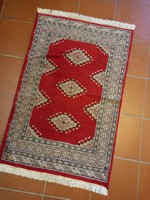 126 X 79 cm hand-knotted bochara rug for sale