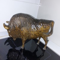 Carved wooden bison statue