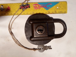 Old large iron padlock with two lock lengths (Russian)