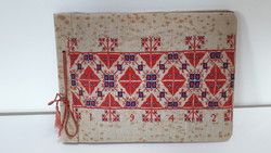 Photo album from 1942, with cross-stitch embroidery